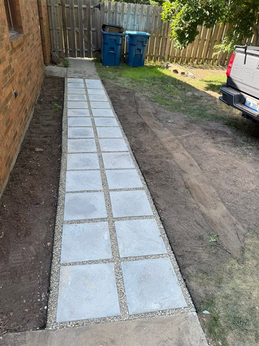 After: paver walkway along the side of the house